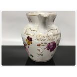 A COALPORT JUG, INSCRIBED EDWARD BARKER, SURGEON, WOORE, SALOP, 1829, PAINTED WITH FLOWERS, 17CM,