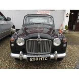 A VINTAGE 1959 ROVER 105 SALOON BLACK LIVERY WITH RED LEATHER INTERIOR.