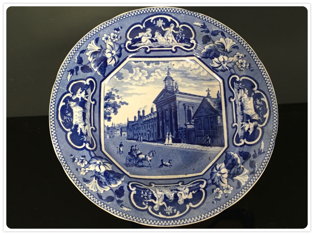 A RIDGWAY OPAQUE CHINA PLATE PRINTED WITH PEMBROKE COLLEGE CAMBRIDGE 25CM.