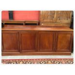 A LARGE VICTORIAN 4 DOOR LOW CUPBOARD 240CM LONG