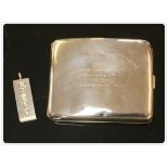 SILVER CIGARETTE CASE, BIRMINGHAM 1936, ENGRAVED TO THE FRONT ALONG WITH A SILVER INGOT, 30G,