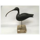 CARVED WOODEN PAINTED RUSTIC BIRD ON A IRON STAKE WITH A LONG BEAK, POSSIBLY EGYPTIAN IBIS BIRD,
