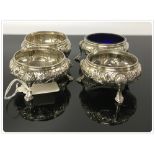 FOUR MATCHING SILVER SALTS, ONE WITH LINER,