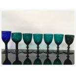 6 GREEN GLASS WINES & 1 BLUE