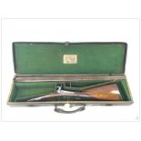 JONES AND SON ANTIQUE PERCUSSION SIDE BY SIDE SHOT GUN IN LEATHER MOTORING CASE