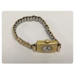 LADY'S 18CT GOLD WRIST WATCH ON EXPANDIN