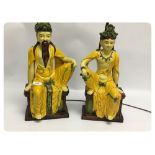 A PAIR OF LAMP BASES WITH SEATED CHINESE