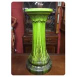 A BRETBY FLOOR STANDING JARDINIERE STAND