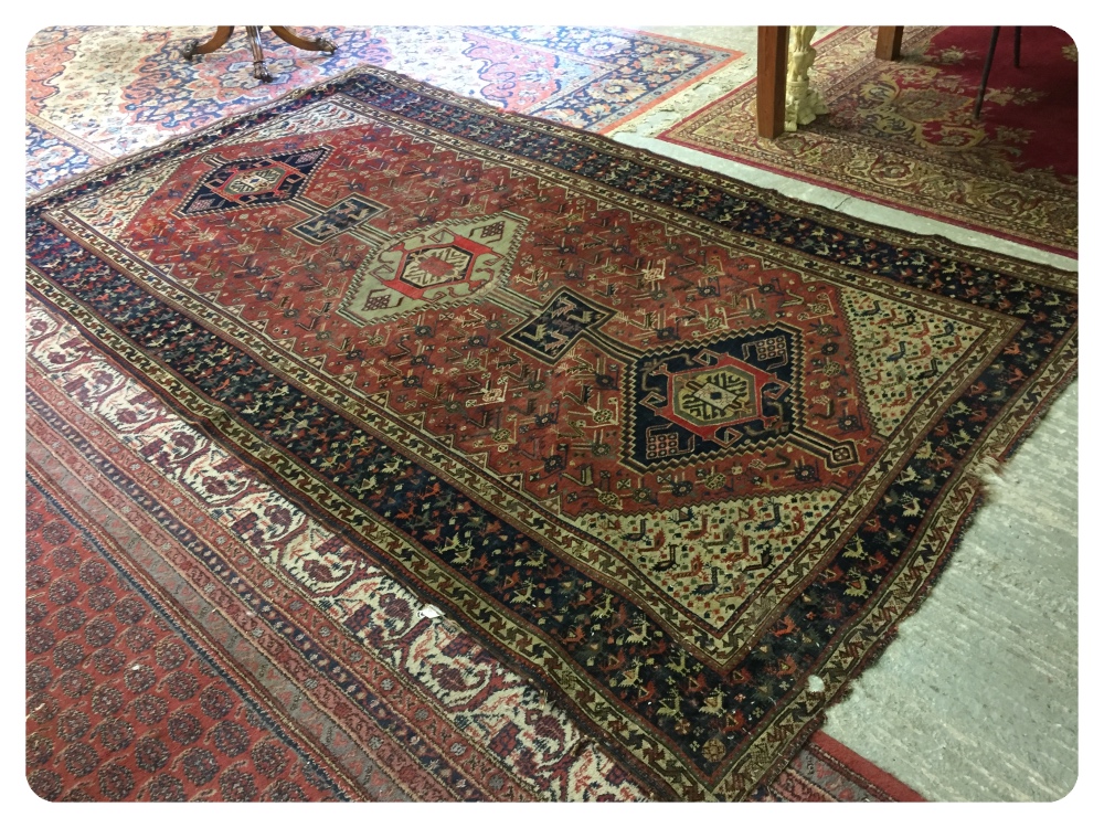 A PERSIAN RUG, THE FOUR MAIN JOINED MEDA