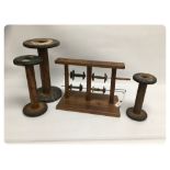 A BOBBIN STAND AND THREE WOOL WORKING RE