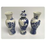 A PAIR OF CHINESE BALUSTER VASES, BLUE A