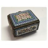 A PERIOD MOSAIC LIDDED BOX ON BUN FEET,