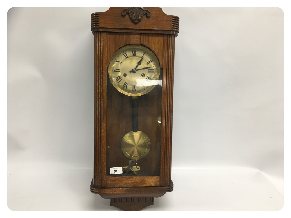 AN OAK REGULATOR STYLE WALL CLOCK WITH S