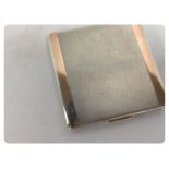 A GOOD QUALITY SQUARE SILVER COMPACT WIT