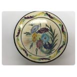 A HAND PAINTED SHALLOW BOWL WITH FLORAL