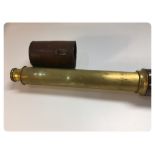 A BRASS, LEATHER COVERED SINGLE DRAW TEL