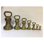 BRASS STANDARD BELL WEIGHTS, COUNTY OF N