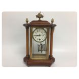 MAHOGANY AND GLASS CASED MANTEL CLOCK, P