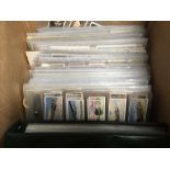 BOX OF CIGARETTE AND TRADE CARDS ON LEAV