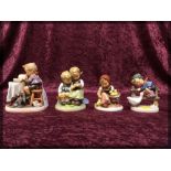 FOUR GOEBEL "HUMMEL" FIGURES, BOY READIN