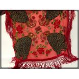 A RED 1930/40'S TASSLED SHAWL HAND STITC