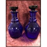 PAIR OF BRISTOL BLUE GLASS DECANTERS WIT