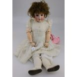 Heinrich Halbig, an early 20th century bisque head doll, number 61/2, sleeping eyes and open mouth