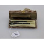 A circa 1956 Conway Stewart number 12 fountain pen, lever fill, marbled blue case and gold nib,