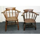 A 19th century beech and elm captain's chair, with bow rail, ring turned stick splats, solid seat,