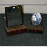 A George III inlaid mahogany swing mirror, fitted three drawers to the base, raised on shaped