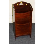 An Edwardian mahogany three section pedestal magazine rack with strung decoration, 87cm high