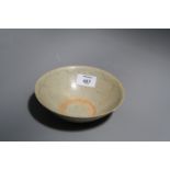 A Chinese Song Dynasty celadon glazed bowl, with incised decoration, 16.5cm diameter