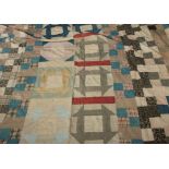 An early 20th century American signed patchwork quilt, signed and annotated Lucy Flagg of
