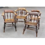 A matched set of four 19th/20th century elm, ash and beech smoker's bow/captain's chairs, one with