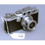 A Leica model III B Rangefinder camera, with Leitz Elmar F=5cm, 1:3,5 lens, 15cm long, Serial Number