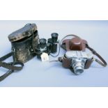 A cased pair of Voigtlander binoculars and a cased Vito 'B' camera