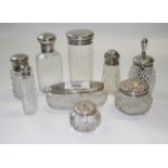 A collection of silver topped dressing table appointments (9)