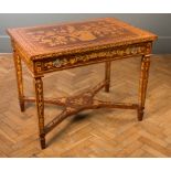 A Louis XV style French rosewood and marquetry table, the top with floral sprays with single