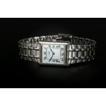 Must de Cartier, a gentleman's silver tank wristwatch, the rectangular enamel dial with Roman