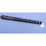 An early 20th century Manchester Special constables truncheon, ebonised and gilt decorated with