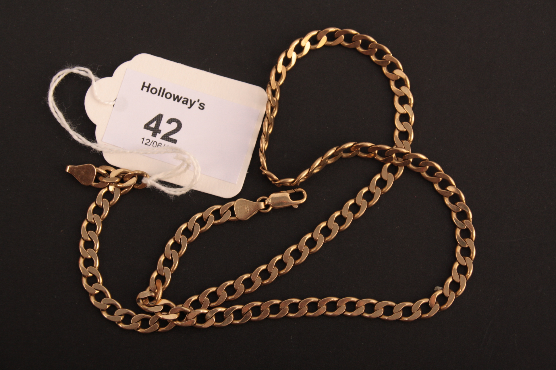 A 9ct gold flattened curb pattern necklace, length 47cm