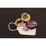 A single stone amethyst brooch, the oval-cut stone in rose gold collet mount, together with a