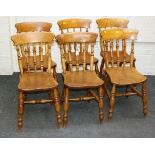 A set of six 19th century beech and elm dining chairs, each having eared rail, spindle turned