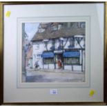 Ethel M. Mallinson (Exh.1898-1948) Figures entering a half-timbered village shop watercolour, signed