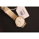 A gentleman's 9ct gold Pierre Renoir quartz wristwatch, white enamel dial, Roman numerals, date