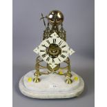 A 20th century brass skeleton clock, the bell striking eight-day single fusee movement faced by