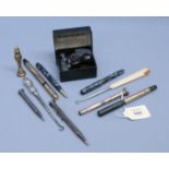 A 9ct gold mounted Onoto fountain pen, together with another 9ct gold mounted fountain pen, a