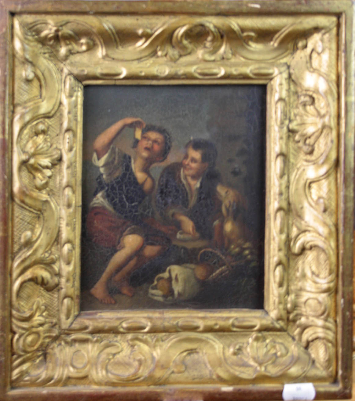 19th century Continental School Two boys picknicking with attendant hound oil on panel 18.5 x 15cm