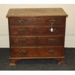 A George III oak low chest of four long drawers, raised on shaped bracket supports, 89cm wide