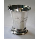 Henry Wilkinson, a silver christening mug, of cylindrical tapering form, with angular scrolled